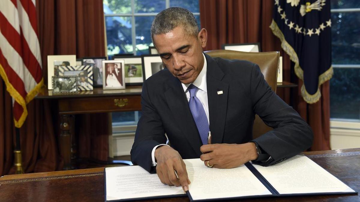 President Barack Obama vetoes the National Defense Authorization Act (NDAA), Oct. 22, 2015, in the Oval Office of the White House in Washington. The president vetoed the sweeping $612 billion defense policy bill, citing objections over how the measure is funded.