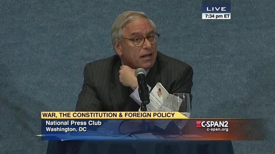 Harvey Rishikof moderating a Sept. 16, 2014 Debate on War and the Constitution between attorneys John Yoo and Bruce Fein.