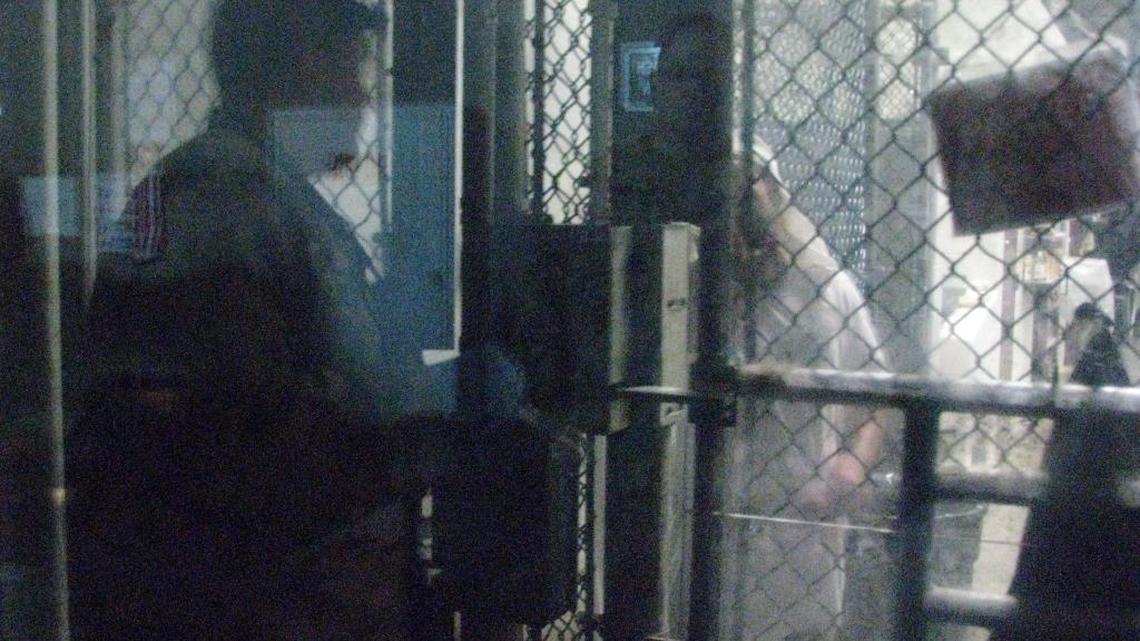 A war-on-terror detainee talks to a guard, separated by chain-linked-fencing at Guantanamo’s Camp 6 on Thanksgiving Day, Nov. 24, 2016 in a photo approved for release by a U.S. military officer at the U.S. Navy base in southeast Cuba.