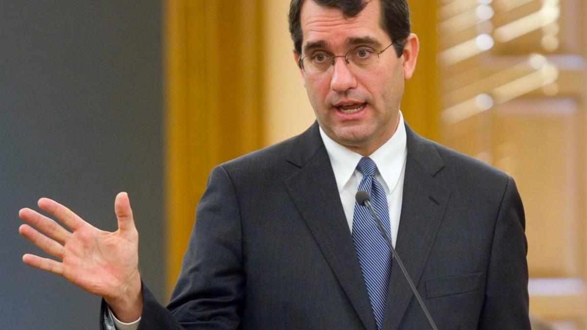 In this Jan. 23, 2015, file photo, Kansas Attorney General Derek Schmidt talks to lawmakers at the Statehouse in Topeka, Kansas.