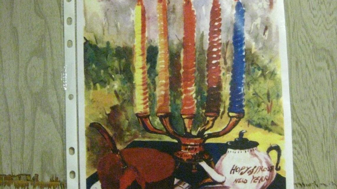 A detainee’s greeting card was hanging on the wall at the Guantánamo Detention Center library storage trailer on Saturday, June 3, 2017. The name of the artist was already redacted on the wall in this image approved for release by the U.S. military.