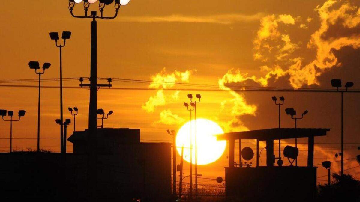 
Sunrise over the detention center at the U.S. Navy base at Guantánamo Bay, Cuba, on Oct. 18, 2012 in this pool photo cleared for release by the Department of Defense. 
