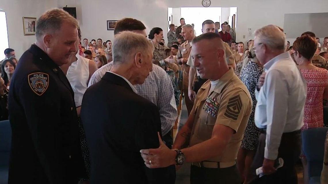 From a Pentagon video showing retired New York firefighter John Vigiano meeting troops at Guantánamo Bay on Feb. 21, 2016, before war court proceedings. He lost two sons on 9/11.