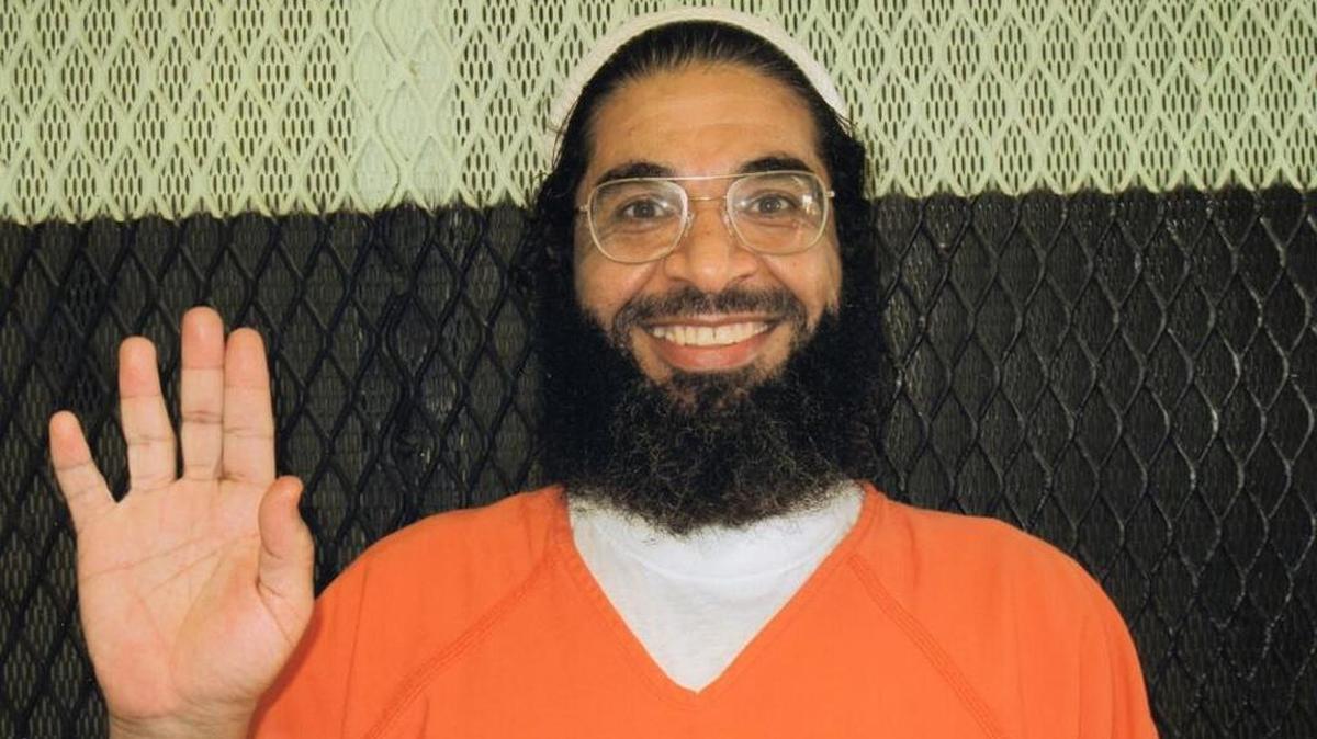 Shaker Aamer, cleared for release since at least 2009, poses for the International Red Cross at the old Camp Delta in a photo released by his family.