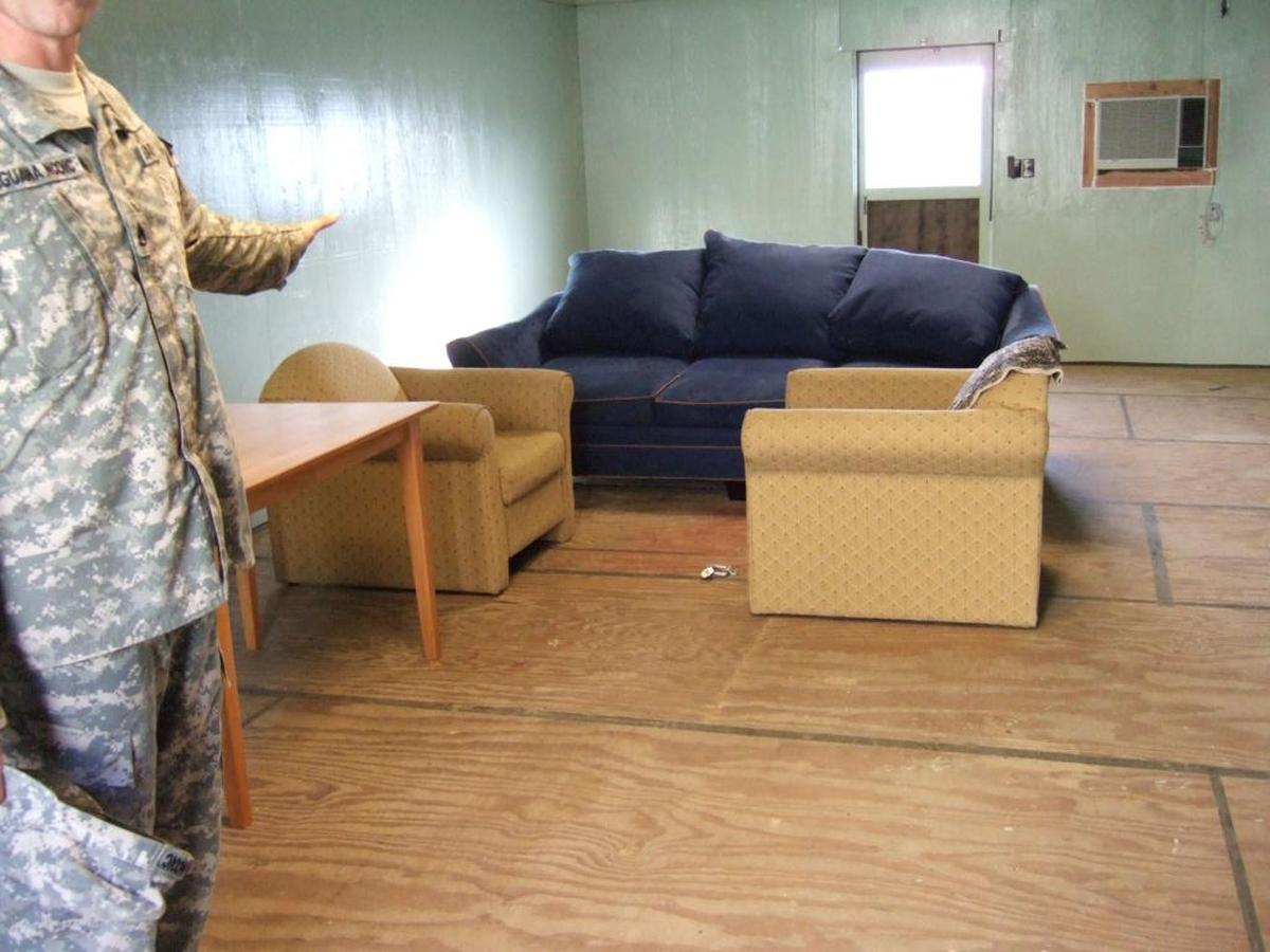 In May 2007, one Camp Iguana hut was used as a meeting spot for lawyers and their captive clients. The military arranged a sofa and two armchairs around a shackle point inside.