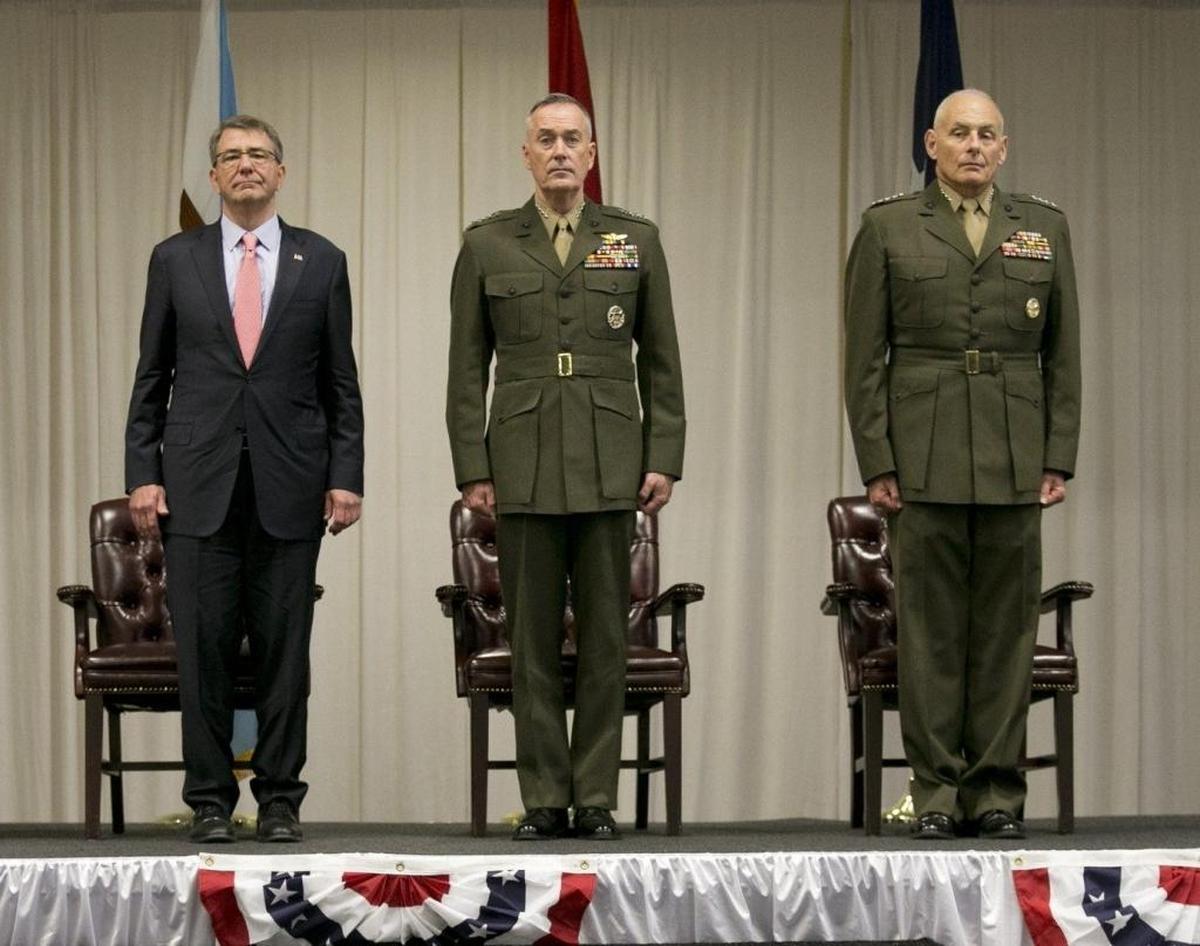 Former Secretary of Defense Ash Carter, Chairman of the Joints Chiefs of Starf, Marine Gen. Joseph Dunford and then Marine Gen. John F. Kelly on the stage at the U.S. Southern Command the day Kelly stepped down as commander, Jan. 14, 2016. Since then, President Donald Trump chose another retired Marine general, Jim Mattis, to replace Carter and recently chose the now retired Kelly to join him at the White House as Chief of Staff.