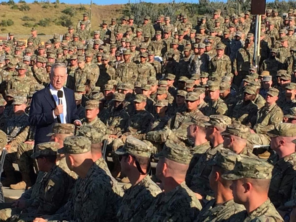 Defense Secretary Jim Mattis talks to troops at an outdoor movie theater at the U.S. Navy base at Guantánamo Bay, Cuba, on Thursday, Dec. 21. 2017.