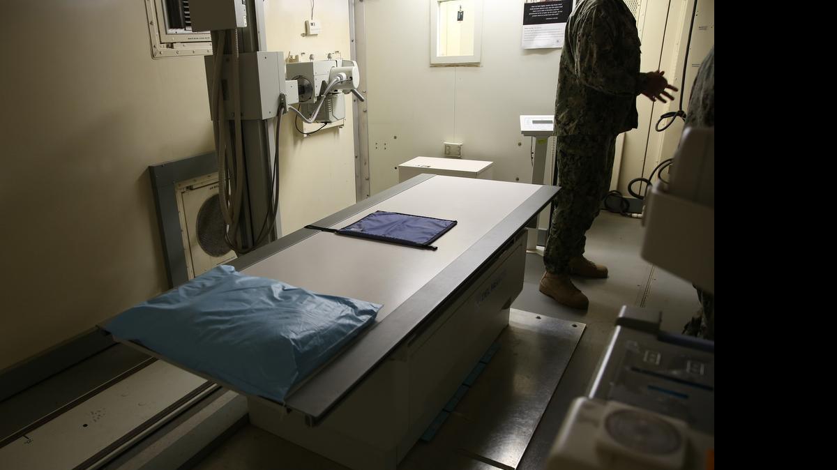 
An X-Ray room inside a trailer at the U.S. Navy base at Guantánamo Bay, Cuba, on Tuesday, July 7, 2015 in an annex of the Detention Center Hospital. More complicated medical procedures are carried out away from the prison compound, at the Naval Station Hospital, which has a CT-Scan, no MRI. U.S. Army soldiers reviewed this photo invoking Pentagon security restrictions and cleared it for release.
