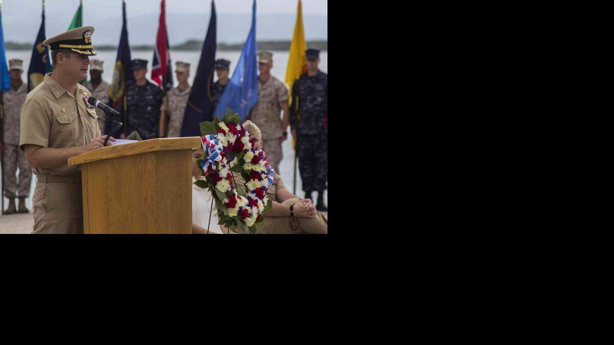 
Capt. John “J.R.” Nettleton, commanding officer of Navy base Guantanamo Bay, Cuba, delivers remarks during a Battle of Midway commemoration ceremony, June 3, 2014 in this Pentagon handout photo.
