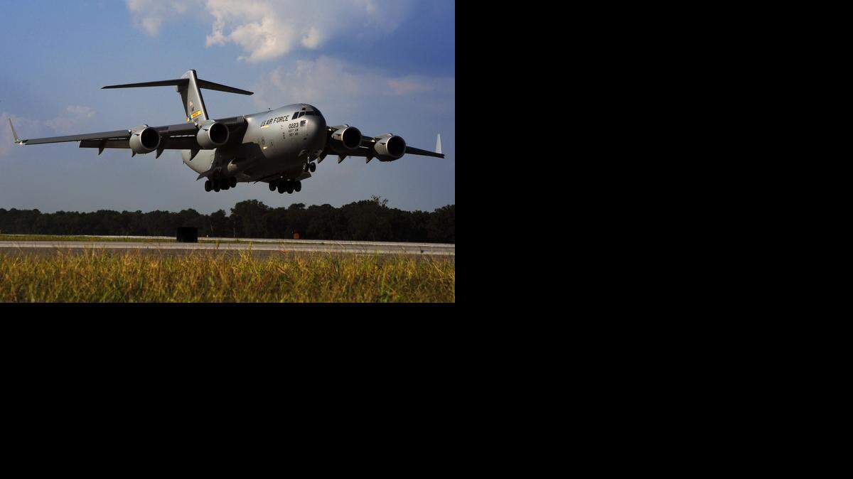 
The last C-17 Globemaster III, P-223, produced for the U.S. Air Force arrives at Charleston, S.C., during a delivery ceremony Sept. 12, 2013.
