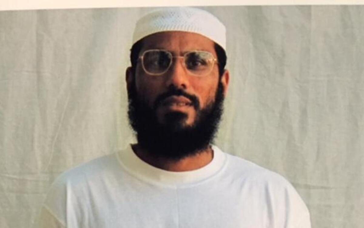 Zahir Hamdoun poses for the International Red Cross in this photo for family approved for release by the prison staff. Courtesy Center for Constitutional Rights