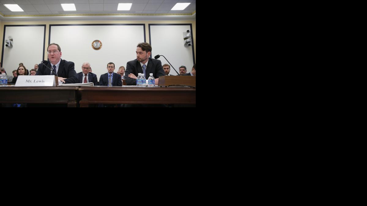 
The Department of Defense Special Envoy for Guantánamo Closure Paul Lewis, left, and the acting State Department Special Envoy for the Closure of Guantánamo Bay Charles Trumbull testify before the House Armed Services Committee's Oversight and Investigations Subcommittee about the transfer of detainees from the military prison in Cuba during a hearing in the Rayburn House Office Building on Capitol Hill Feb. 12, 2015 in Washington, DC. 
