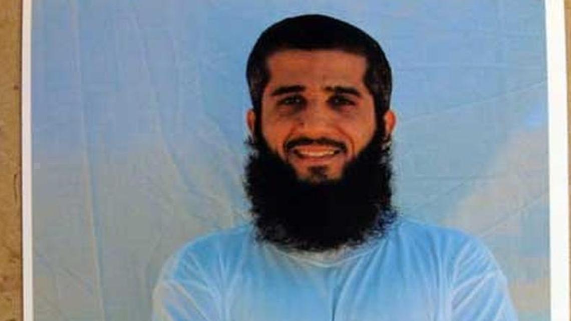 Fayez al Kandari, posing for the International Red Cross, in this undated Guantánamo photo.