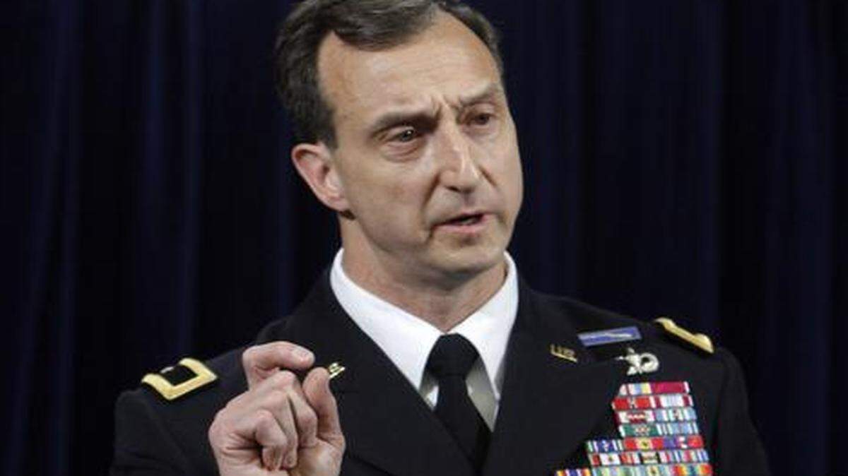 
Army Brig. Gen. Mark Martins, the chief war crimes prosecutor, speaks at a press conference on May 6, 2012 at the U.S. Navy base at Guantánamo Bay, Cuba, after the arraignment of Khalid Sheik Mohammed and four alleged accomplices in the 
9/11 attacks.

