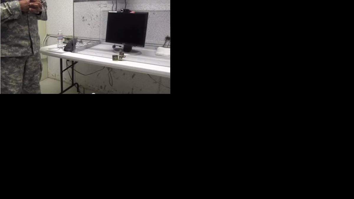 
In March 2014, a soldier showed reporters the cell at Guantánamo Camp Echo where certain captives are allowed to have video chats with family.

