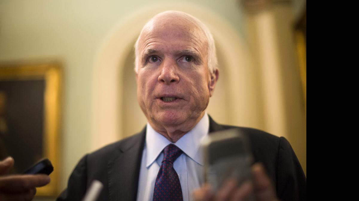 
Sen. John McCain, R-Ariz. speaks to reporters on Capitol Hill in Washington, May 5, 2015, before a GOP luncheon. 
