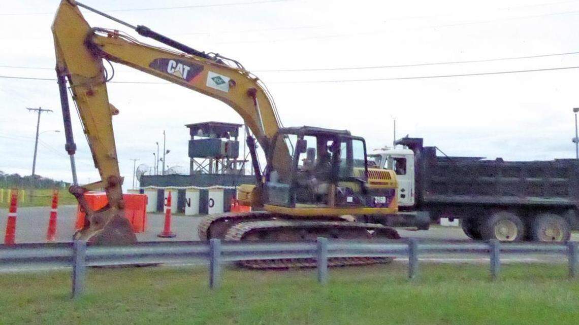 Contractors doing road work near the entrance to the Detention Center Zone at Guantánamo on Jan. 18, 2018, in an image approved for release by the U.S. military that day.