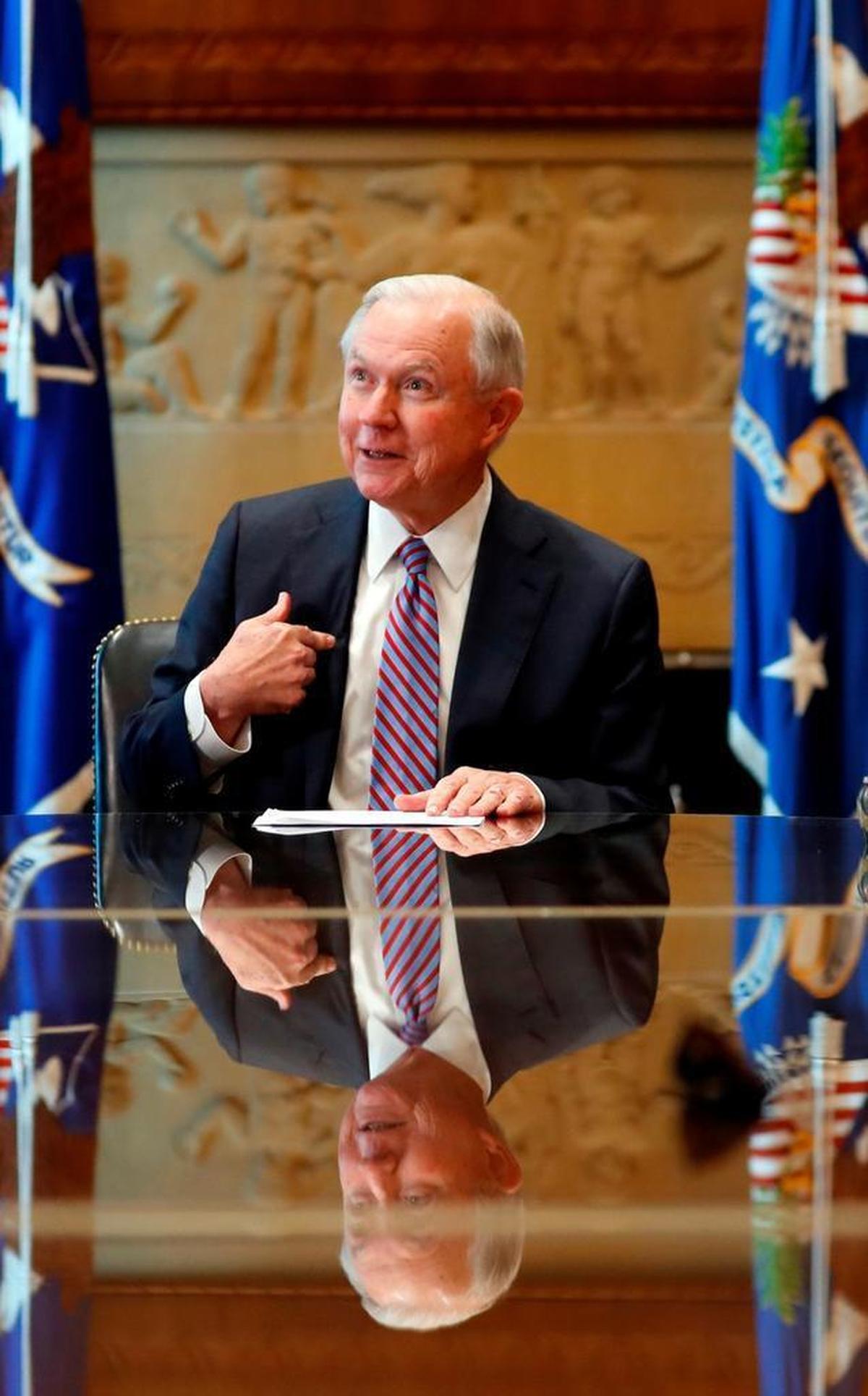 Attorney General Jeff Sessions meets with families of victims killed by illegal immigrants at the Department of Justice, Thursday, June 29, 2017, in Washington.