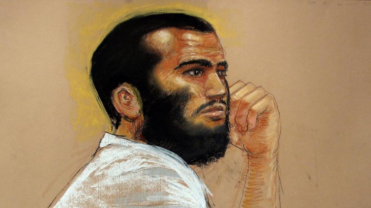 
An April 28, 2010 artist’s rendering shows Canadian defendant Omar Khadr at his hearing in the courthouse for the U.S. military war crimes commission at the Camp Justice compound at Guantánamo Bay.
