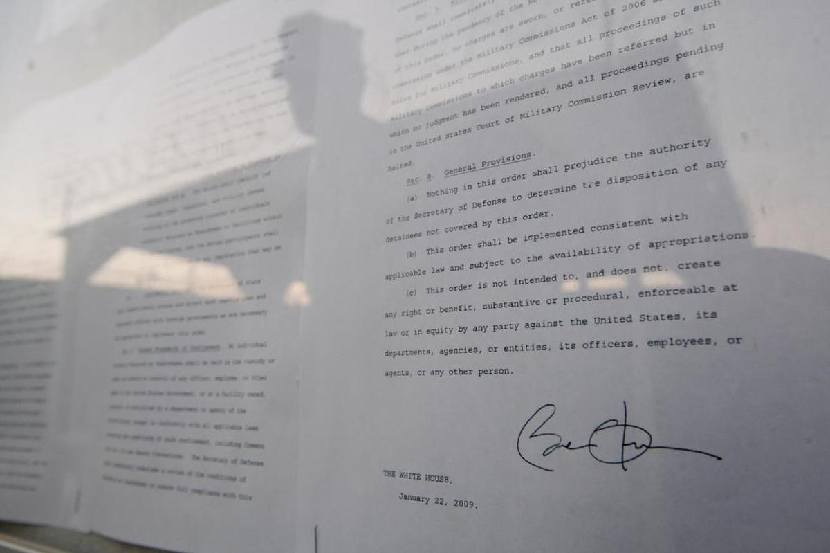A copy of President Barack Obama’s executive order requiring the closure of the prison camps is seen posted on a bulletin board at Camp 4 at the U.S. Navy Base at Guantánamo Bay, Cuba, on April 2, 2009, in this image approved for release by the military.