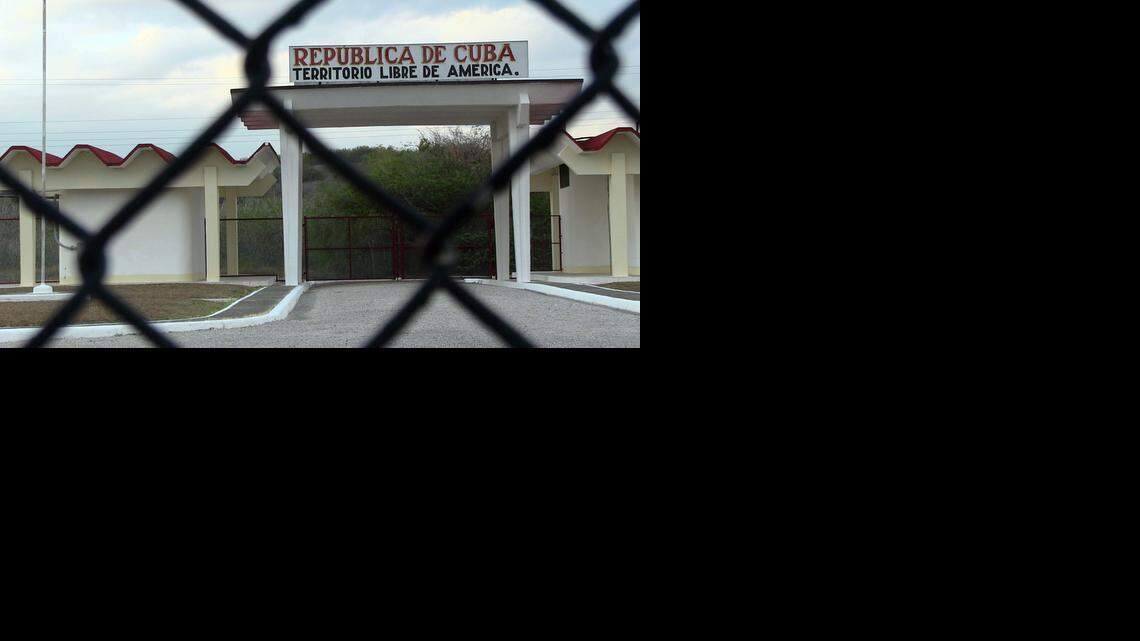 
Peering through the fence from the U.S.-controlled portion into the Cuban side of the Northeast Gate on March 20, 2014 at the U.S. Navy base at Guantánamo Bay, Cuba.
