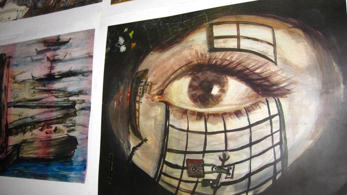 Guantánamo prison had this painting by Yemeni “forever prisoner” Khalid Qasim on the wall on Saturday, Dec. 10, 2016, as part of their display of 2016 art projects done by captives. The photo was approved for release by the U.S. military at the U.S. Navy base in southeast Cuba.