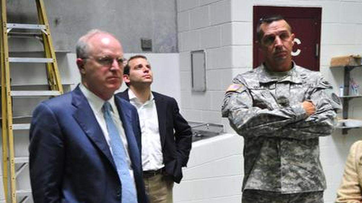
Special Envoy Clifford Sloan, the State Department's special envoy for Guantánamo’s prison closure, toured the facility in the company of Army Col. John Bogdan, the chief of the guard force, on July 3, 2013. At the time, the prison held 166 war on terror detainees. As of this week, with a transfer of four Afghan captives home, the prison census was 132.


