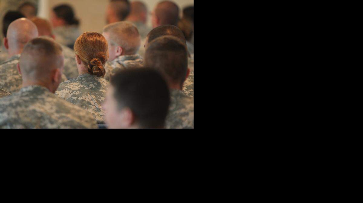 
Army guards, mostly men, but also a woman, attend an awards ceremony in the Detention Center Zone at the U.S. Navy base at Guantánamo Bay, Cuba, on Tuesday, Nov. 4, 2014, in this photo approved for release by the U.S. military.

