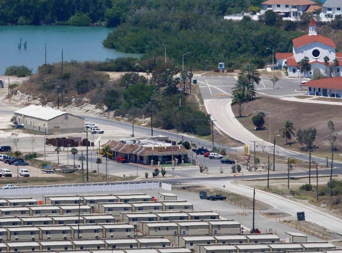 The Guantánamo prison staff trailer park, to be replaced by $124 million barracks, sits across the street from the base McDonald's, as seen in this March 30, 2009, base photo, which was approved for release by the U.S. military.