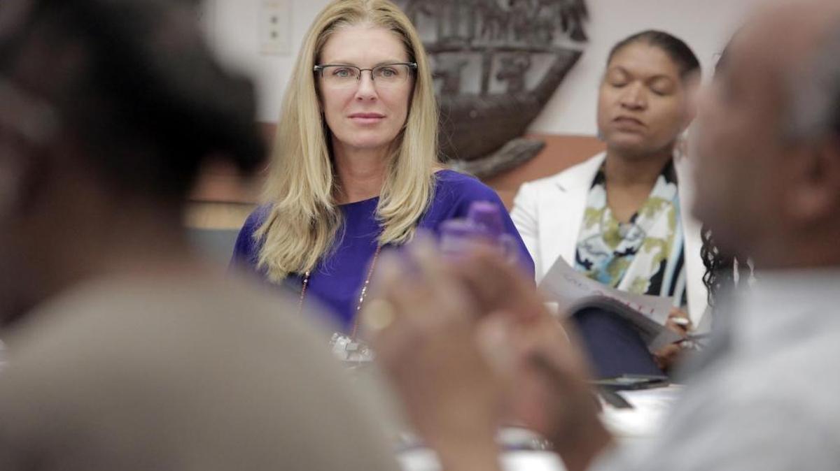 Michele King Soffer, (center) listens during a workshop at the Little Haiti Cultural Center with members of the Haitian community. Soffer is married to Donald Soffer, the developer of Aventura and the Turnberry Isle brand, and is of Haitian descent. She supports an orphanage in Haiti and is involved in the Ayiti Community Trust, which is seeking to raise $20 million for grassroots organizations in Haiti.