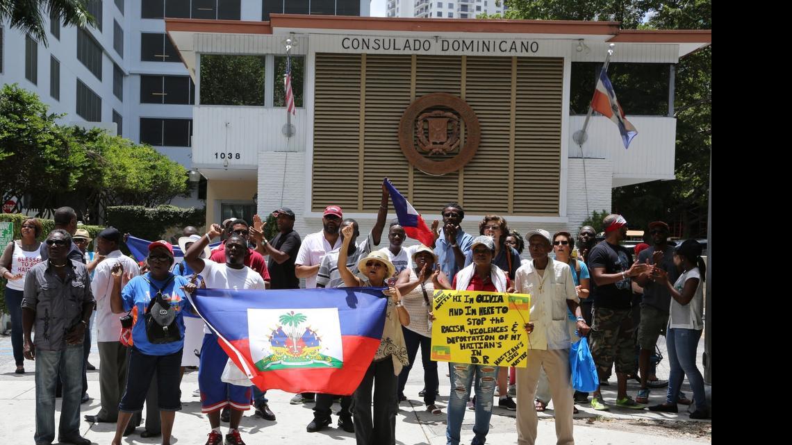 
Dozens of Haitians rally outside the Dominican Republic consulate on Brickell Avenue to protest the threatened mass deportation of Haitians from the Dominican Republic on Thursday, June 25, 2015. 
