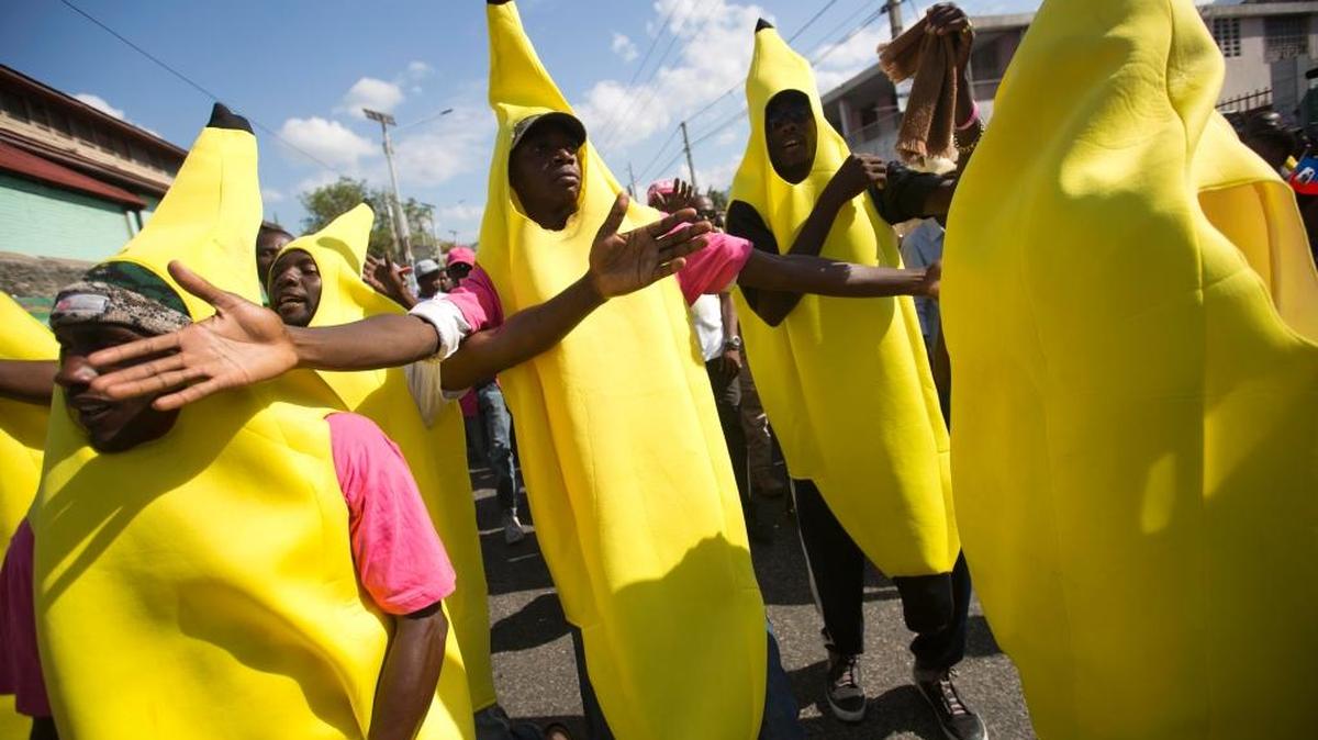 Haitians dressed as bananas to show their support for organic banana farmer and presidential candidate Jovenel Moise, from the PHTK party, march to demand elections be reinstated, in Port-au-Prince on Tuesday. Haiti had been scheduled to hold a presidential and legislative runoff Jan. 24. But the now-splintered provisional electoral council canceled it for a second time amid the protests and suspicion that the first round was marred by widespread fraud favoring Moise, President Michel Martelly's chosen candidate.