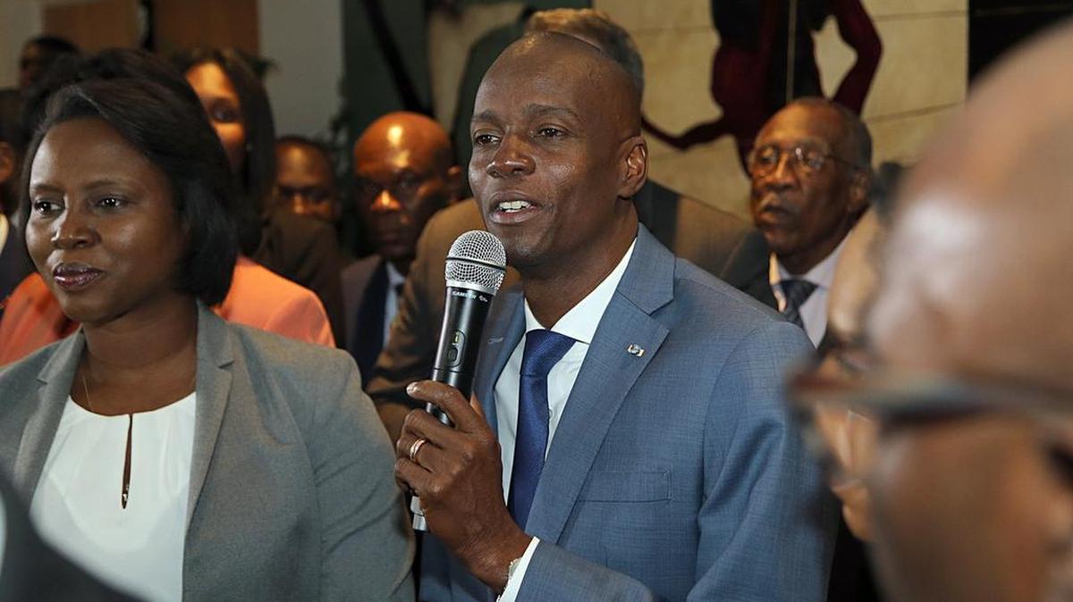 Haitian President Jovenel Moïse, accompanied by his wife, Martine Marie Etienne Joseph, speaks to a group of Haitians living in South Florida who welcomed him as he makes his first visit to Miami as president during a community meeting at the Little Haiti Cultural Center on Friday, June 16, 2017.