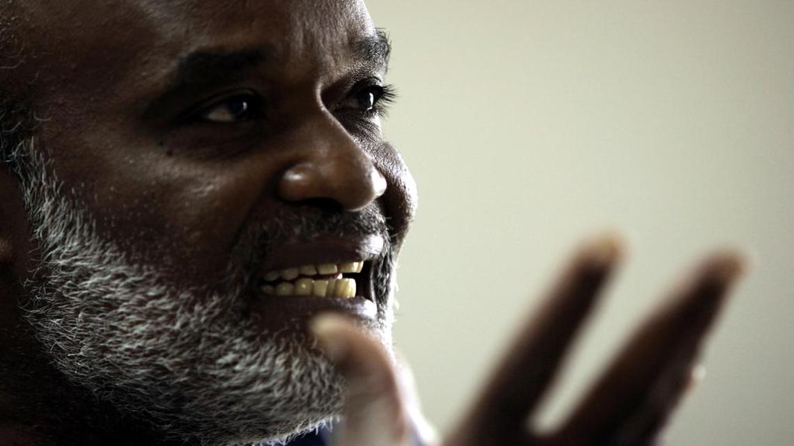 File Photo: Haitian presidential candidate Rene Preval gestures as he speaks to the media in the town of Marmelade, Haiti on Friday Feb. 10, 2006.
