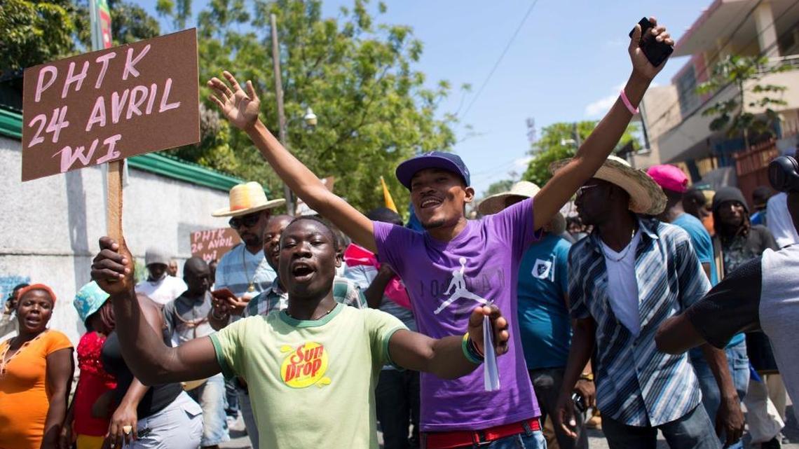 Supporters of presidential candidate Jovenel Moise, from the PHTK political party, chant slogans against interim president Jocelerme Privert as they demand he respect the upcoming election date in Port-au-Prince, Haiti, on March 9. The next election is scheduled for April 24 but is likely headed for another postponement.
