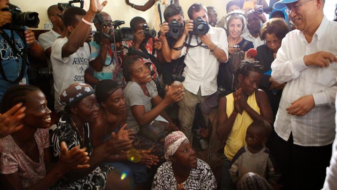 U.N. Secretary-General Ban Ki-moon, right, speaks with women whose homes were destroyed by Hurricane Matthew, in a school where they have sought shelter in Les Cayes, Haiti, Saturday, Oct. 15, 2016. Ban Ki-moon arrived to see a sliver of the extensive destruction left by Hurricane Matthew as storm victims continued to express frustration at delays in aid more than a week-and-a-half since the Category 4 storm hit.