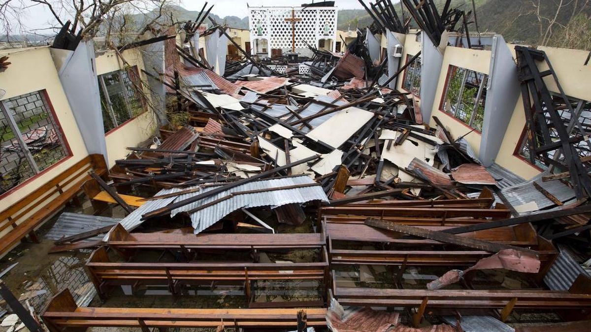 Saint Anne church lays totally destroyed by Hurricane Matthew in Camp Perrin, a district of Les Cayes, Haiti, Thursday, Oct. 6, 2016. Two days after the storm rampaged across the country's remote southwestern peninsula, authorities and aid workers still lack a clear picture of what they fear is the country's biggest disaster in years.