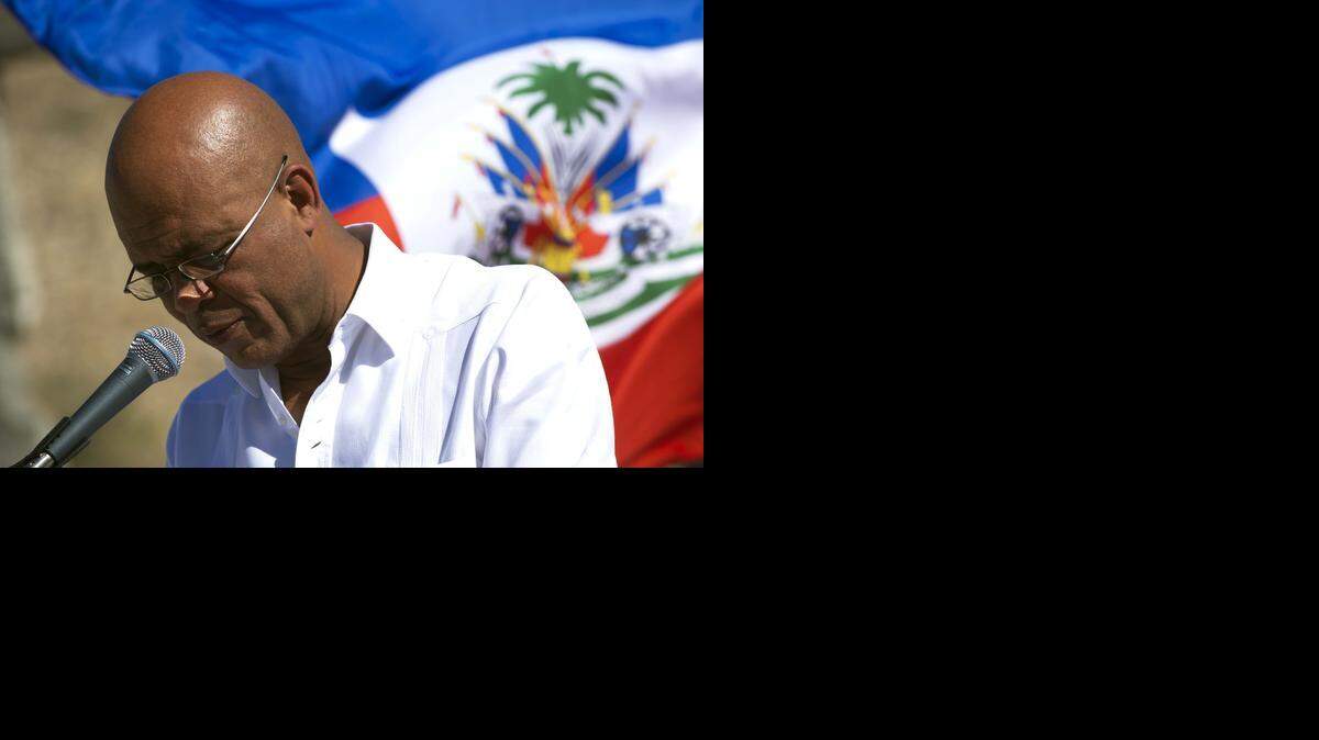 
Haitian President Michel Martelly speaks during a memorial ceremony in Titanyin, in honor of the victims of earthquake that hit Haiti on January 12, 2010. Haiti marks the fifth anniversary of a catastrophic earthquake that killed 300,000 people.
