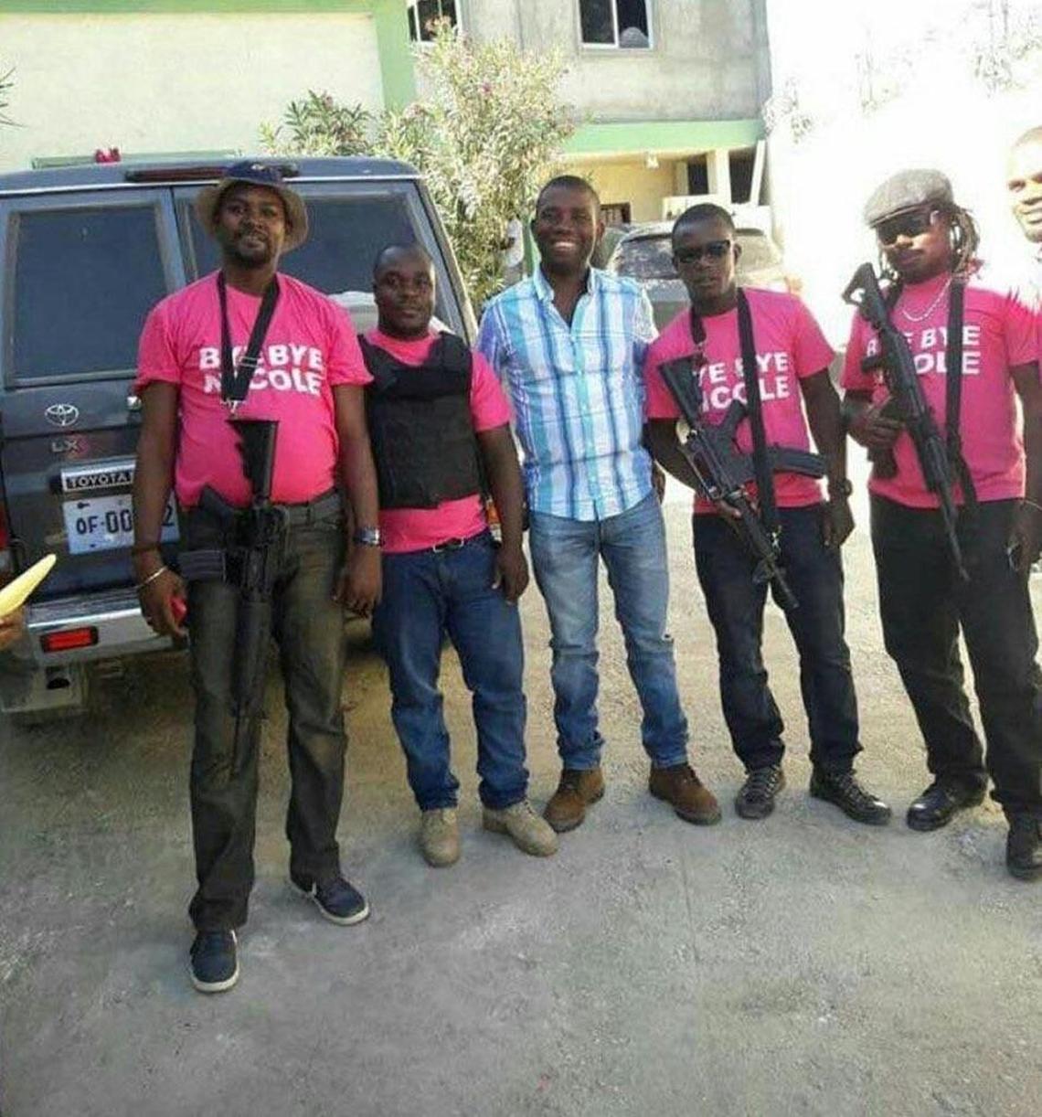 Haitian senator-elect Guy Philippe poses with associates days before his arrest in early January to face drug-trafficking and money-laundering conspiracy charges in Miami federal court.