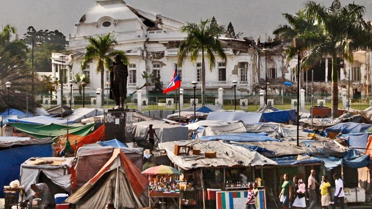 The streets surrounding the National Palace are filled with vendors shopping their wares in the tent city surrounding the devastated National Palace in Port au Prince a year after the 7.0 earthquake that claimed 300,000 lives and displaced millions of Haitians.