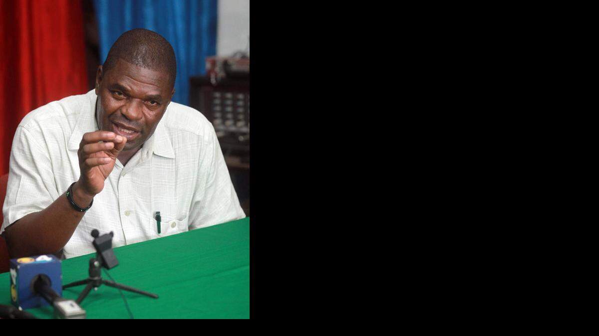 
Tony Jeanthenor, a member of Haitian rights group Veye Yo, at a press conference Saturday, Oct. 4, 2014, talking about former Haitian President Jean-Claude “Baby Doc” Duvalier.
