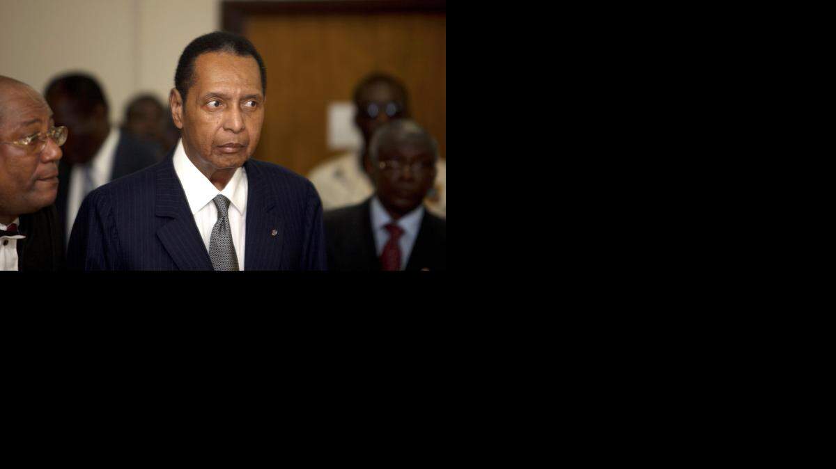
Former Haitian dictator Jean-Claude “Baby Doc” Duvalier appears in a Port-au-Prince courtroom in March 2013.

