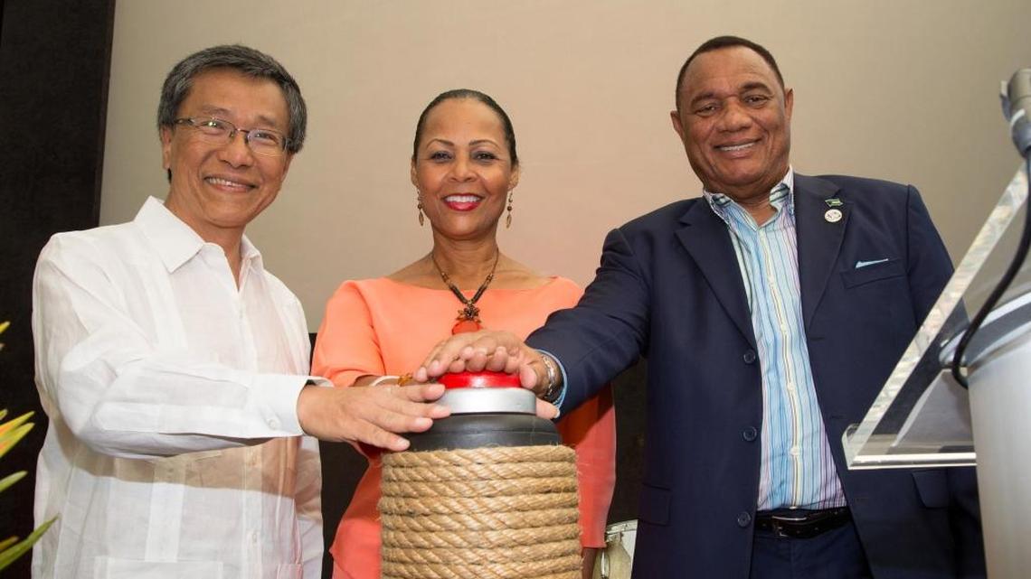 Bahamas Prime Minister Perry G. Christie, far right, is trying to lead his Progressive Liberal Party to a second consecutive five year term in office. He is seen here with Tan Sri KT Lim, chairman of the Genting Group, and wife Bernadette Christie in Bimini.