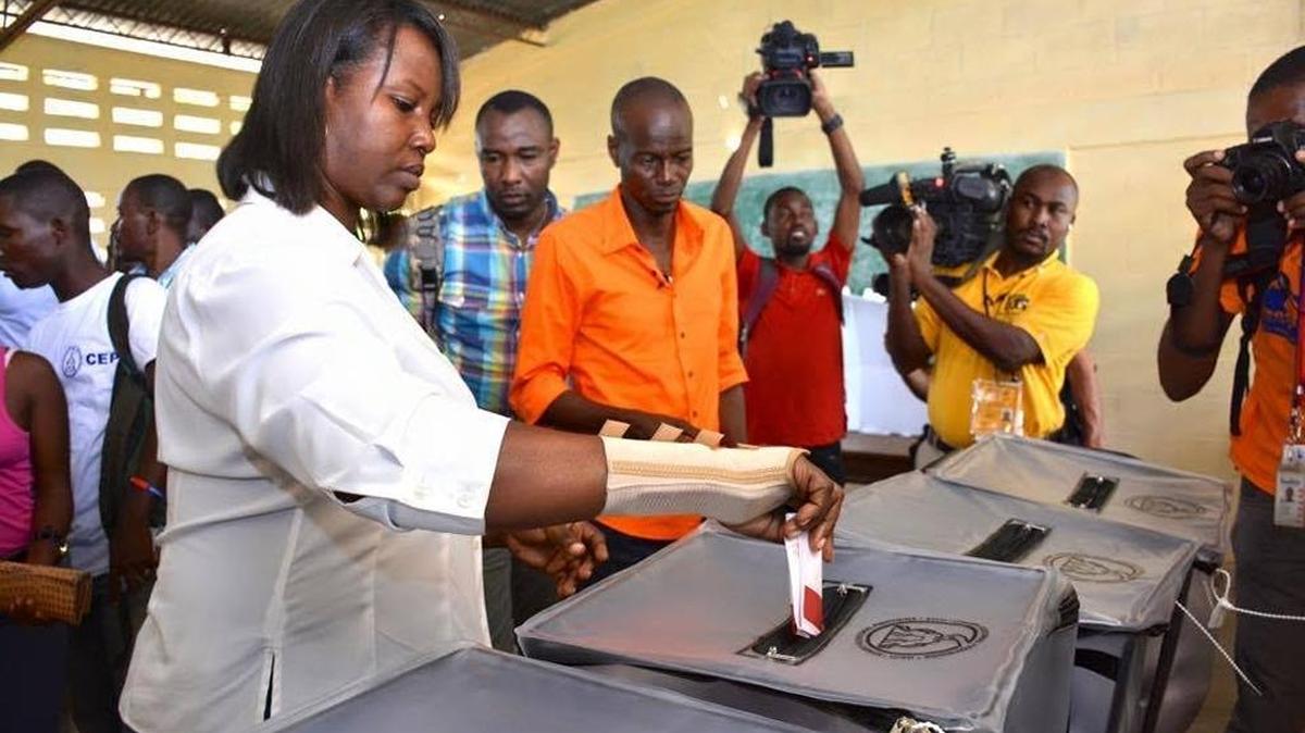 President Michel Martelly's hand-picked successor Jovenel Moise votes in northern Haiti on Sunday.