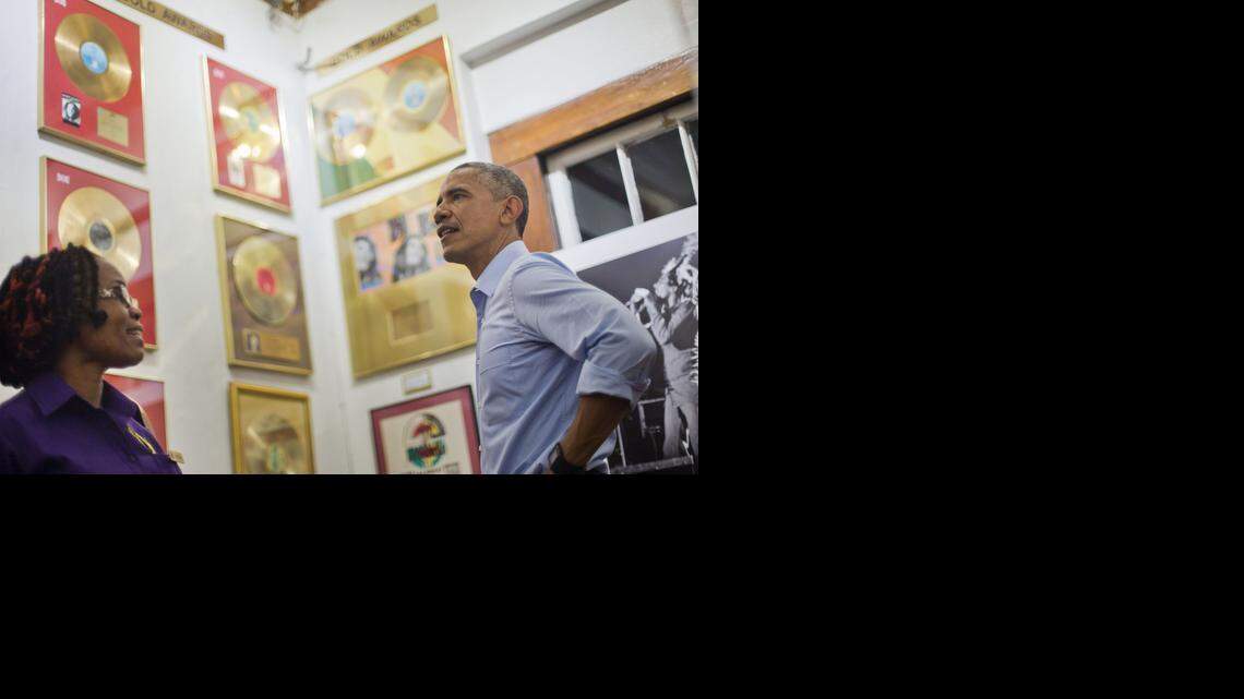 
U.S. President Barack Obama, right, visits the Bob Marley Museum with tour guide Natasha Clark, left, Wednesday, April 8, 2015 in Kingston, Jamaica.
