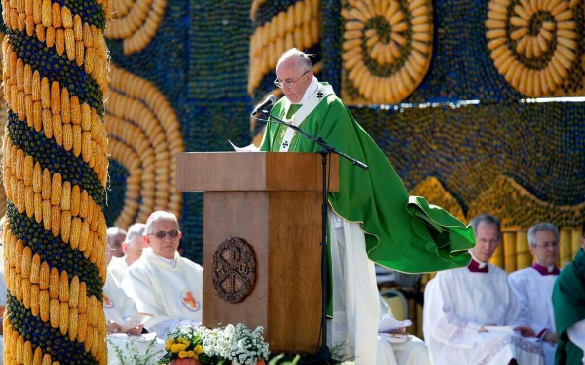 
Pope Francis celebrates mass in Asuncion, Paraguay, Sunday, July 12, 2015. Hundreds of thousands have gathered on a huge swampy field called Nu Guazu inside a military base to attend the mass. At this very spot, Pope John Paull II in 1988 canonized Paraguay's first saint, Roque Gonzalez de Santa Cruz, a Jesuit priest that was a missionary to the Guarani people.
