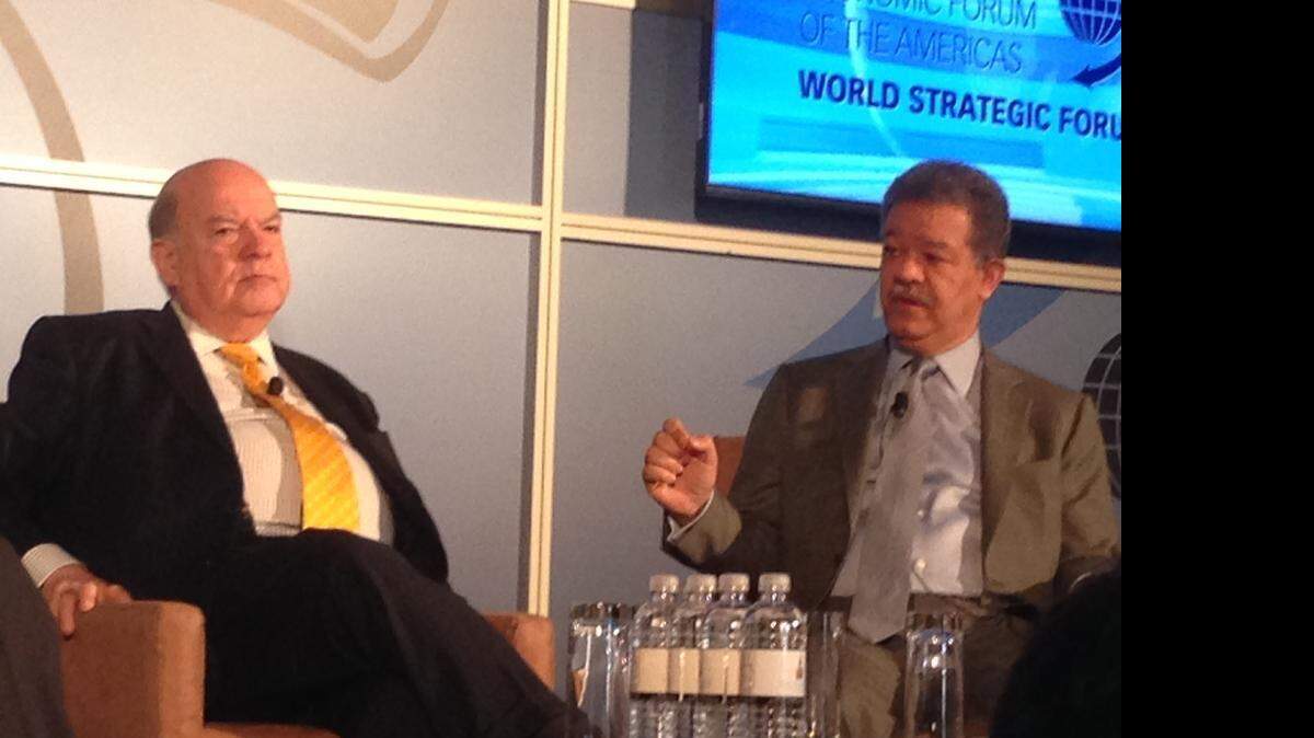 
OUTREACH: Jose Miguel Insulza, left, with former Dominican Republic President Leonel Fernandez.  
