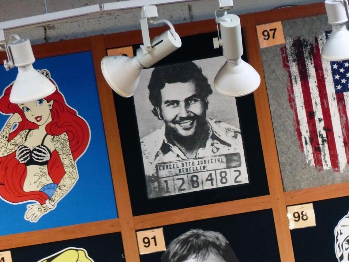 On Miami Beach, tourists can buy clothes with Pablo Escobar’s smiling mug shot after he was arrested.