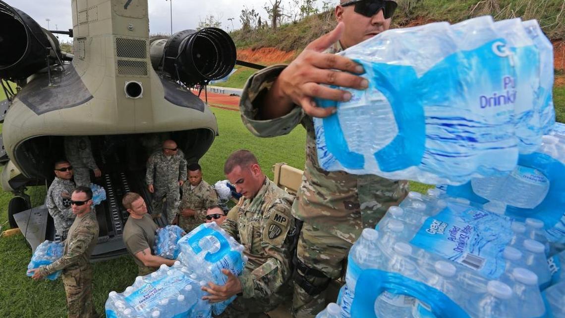 The US military delivers water and supplies to Barranquitas, Puerto Rico earlier this week.
