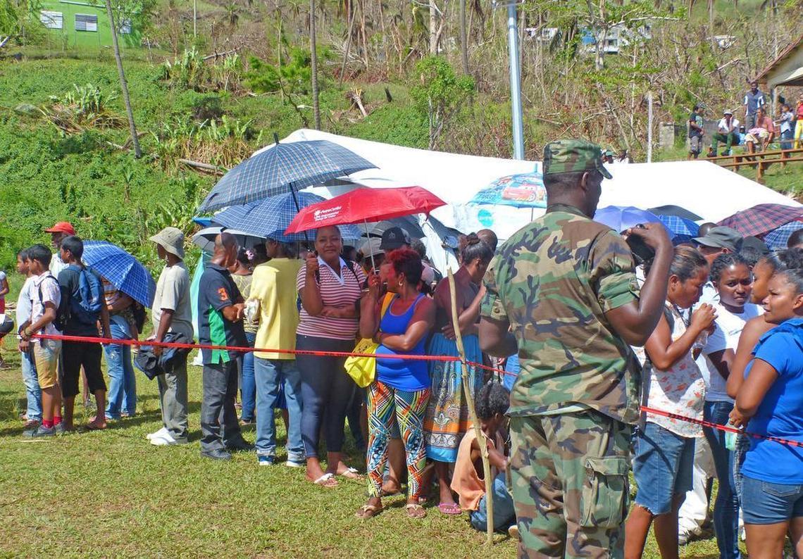 Hurricane Maria survivors in Salybia, a farming village in Dominica’s Kalinago territory, receive rations of rice, tuna, lentils, flour and salt that were being distributed by U.N. humanitarian agencies in cooperation with the government and local authorities.